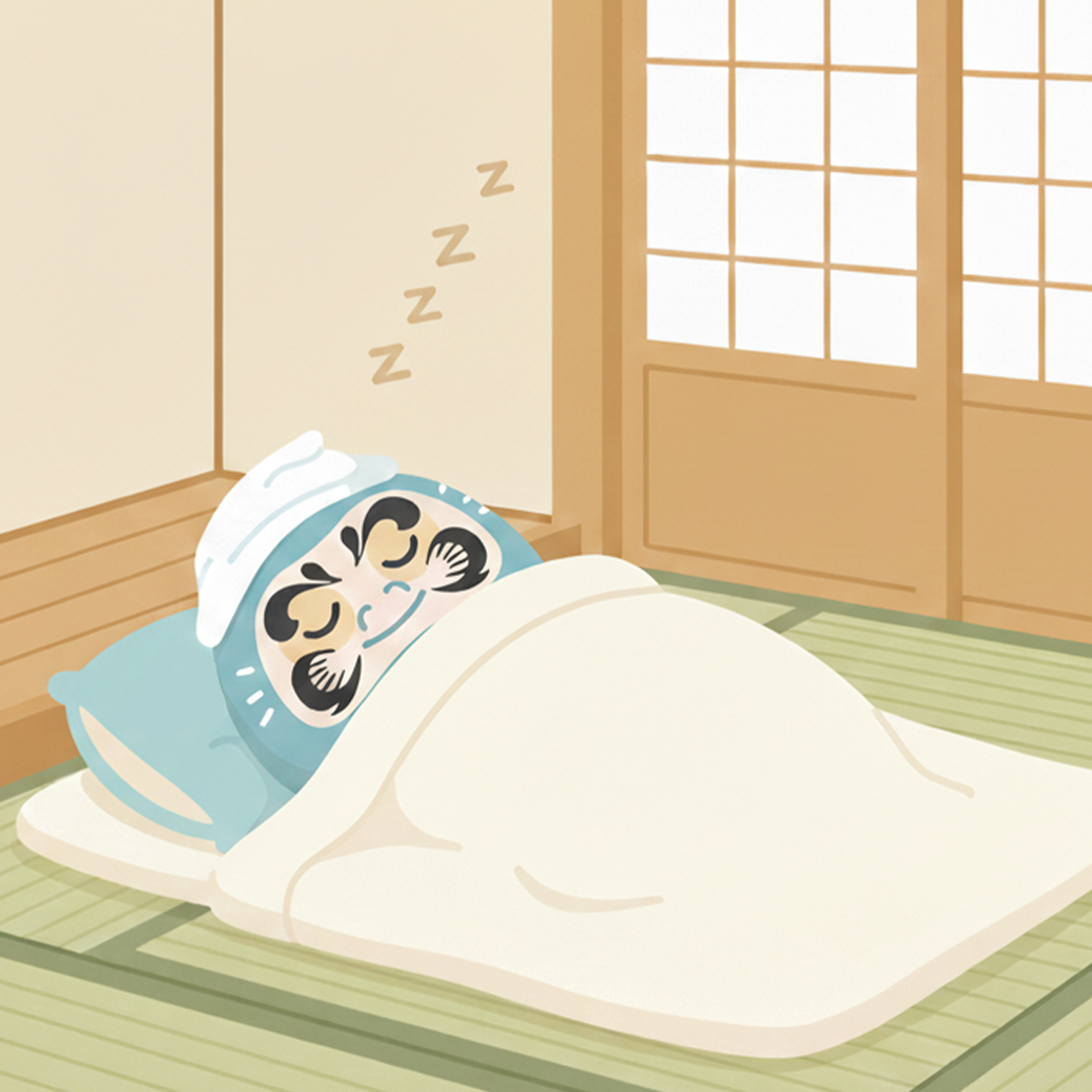 布団で寝ているだるま